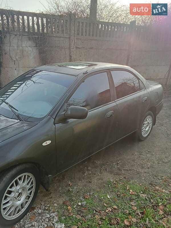 Седан Mazda 323 1995 в Одесі фото 12 Седан Mazda 323 1995 в Одесі