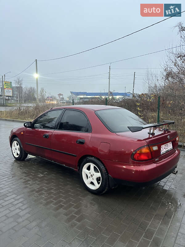 Седан Mazda 323 1996 в Рівному фото 4 Седан Mazda 323 1996 в Рівному