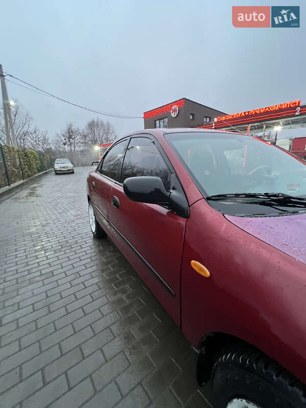 Седан Mazda 323 1996 в Рівному фото 13 Седан Mazda 323 1996 в Рівному