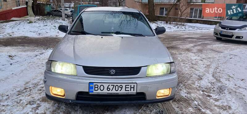 Седан Mazda 323 1997 в Ровно фото Седан Mazda 323 1997 в Ровно