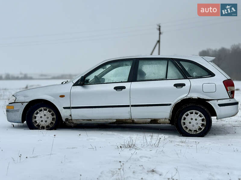 Хэтчбек Mazda 323 1999 в Калиновке фото 3 Хэтчбек Mazda 323 1999 в Калиновке