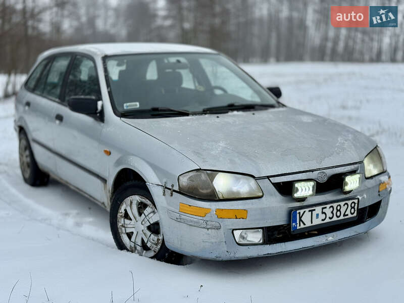 Хэтчбек Mazda 323 1999 в Калиновке фото 11 Хэтчбек Mazda 323 1999 в Калиновке