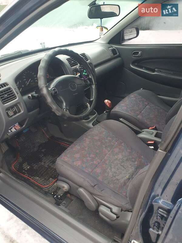 Седан Mazda 323 1998 в Киеве фото 25 Седан Mazda 323 1998 в Киеве