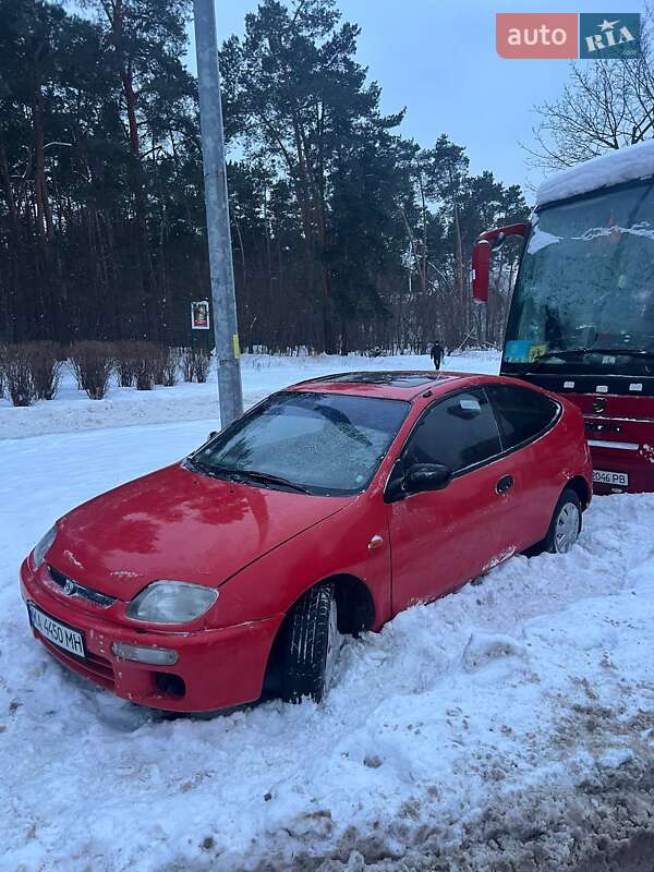 Хетчбек Mazda 323 1995 в Києві фото 11 Хетчбек Mazda 323 1995 в Києві