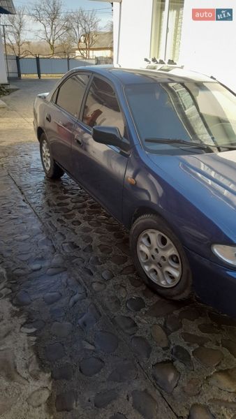 Седан Mazda 323 1996 в Косові