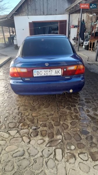 Седан Mazda 323 1996 в Косові