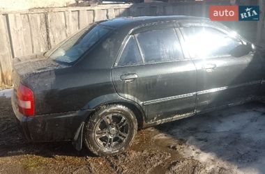 Седан Mazda 323 2002 в Ріпках