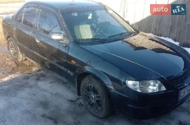 Седан Mazda 323 2002 в Ріпках