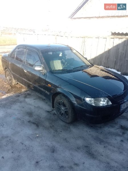 Седан Mazda 323 2002 в Ріпках