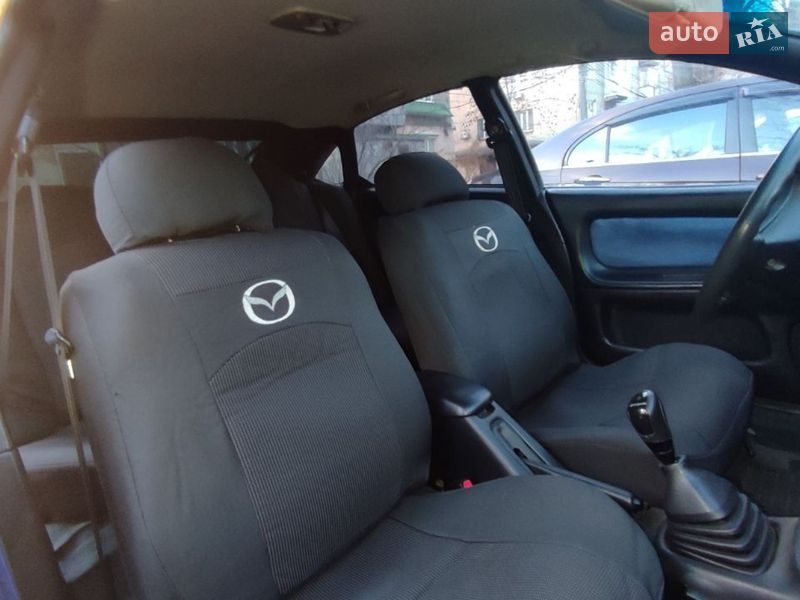Хетчбек Mazda 323 1997 в Кривому Розі фото 10 Хетчбек Mazda 323 1997 в Кривому Розі