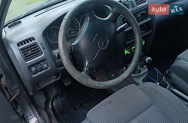 Седан Mazda 323 1997 в Новомосковске