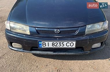 Седан Mazda 323 1997 в Полтаві фото Седан Mazda 323 1997 в Полтаві