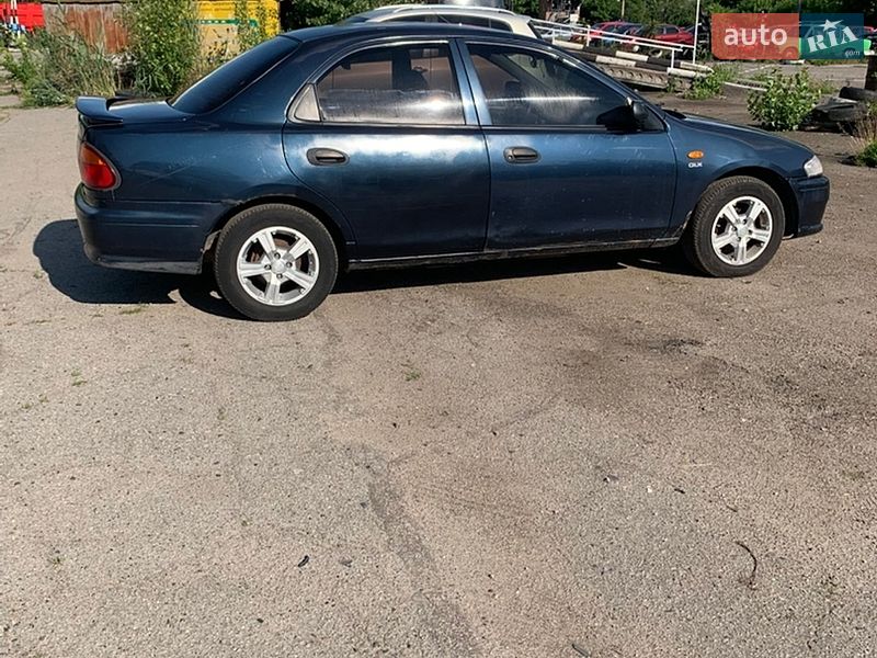 Седан Mazda 323 1997 в Полтаві фото 3 Седан Mazda 323 1997 в Полтаві