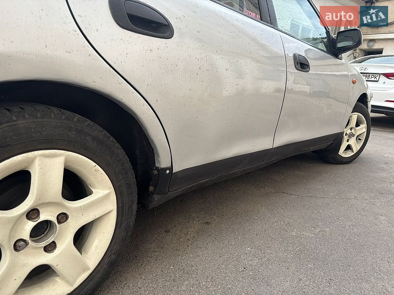 Седан Mazda 323 1997 в Одессе