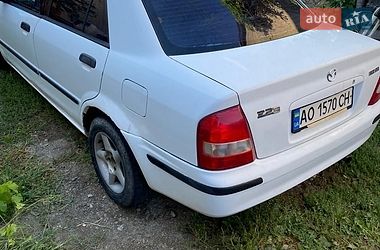 Седан Mazda 323 1999 в Хусте