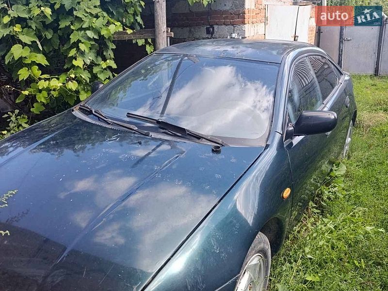 Хэтчбек Mazda 323 1996 в Каменец-Подольском фото 4 Хэтчбек Mazda 323 1996 в Каменец-Подольском