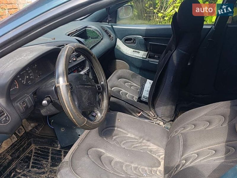 Хэтчбек Mazda 323 1996 в Каменец-Подольском фото 5 Хэтчбек Mazda 323 1996 в Каменец-Подольском