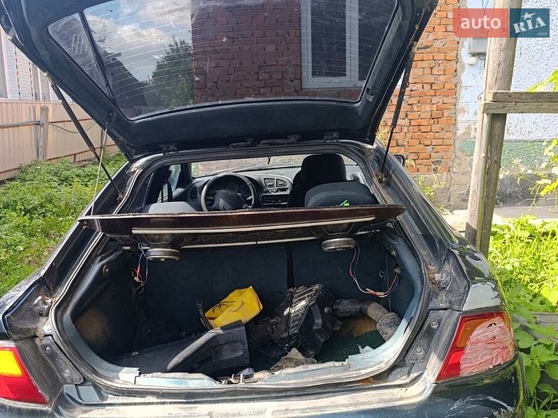 Хэтчбек Mazda 323 1996 в Каменец-Подольском фото 3 Хэтчбек Mazda 323 1996 в Каменец-Подольском