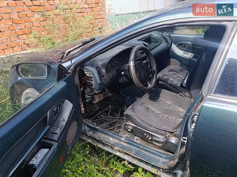Хэтчбек Mazda 323 1996 в Каменец-Подольском фото 2 Хэтчбек Mazda 323 1996 в Каменец-Подольском