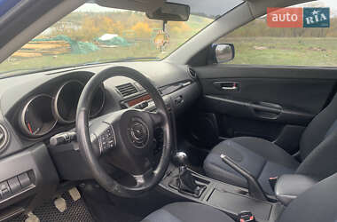 Хэтчбек Mazda 3 2004 в  фото 8 Хэтчбек Mazda 3 2004 в