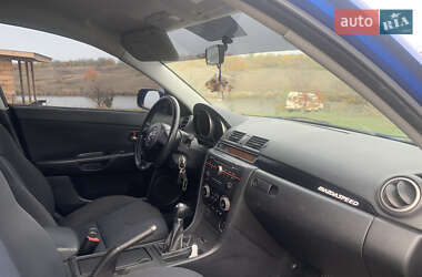 Хэтчбек Mazda 3 2004 в  фото 12 Хэтчбек Mazda 3 2004 в