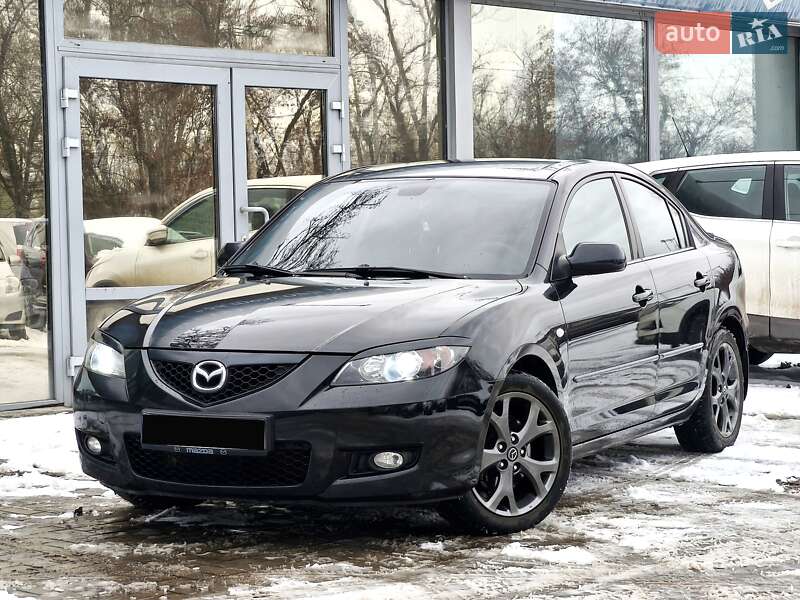2007 Mazda 3, VIN JMZBK12F671574115:plate — фото 1 (autoria)
