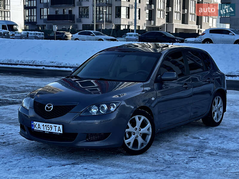 2007 Mazda 3, VIN JM7BK346371357623:plate — фото 1 (autoria)
