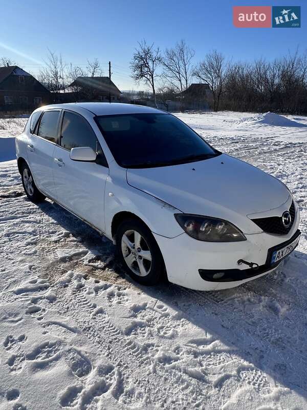 2007 Mazda 3, VIN JMZBK146271588505:plate — фото 1 (autoria)