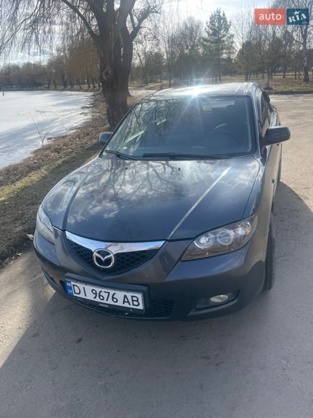 2006 Mazda 3, VIN JMZBK12Z571511704:plate — photo 1 (autoria)