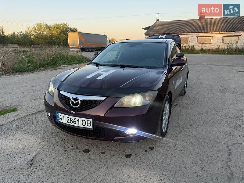 2007 Mazda 3, VIN JMZBK12Z571579281:plate — фото 1 (autoria)