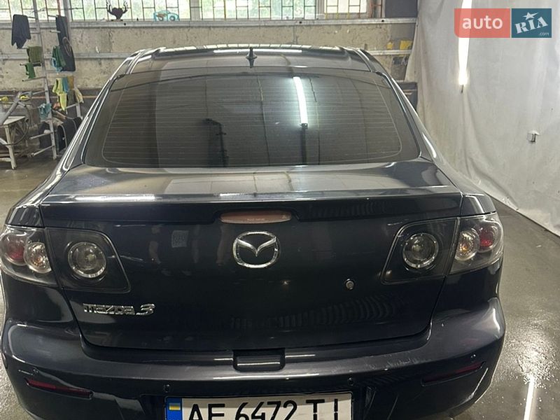2008 Mazda 3, VIN JM7BK326981390677:plate — фото 1 (autoria)