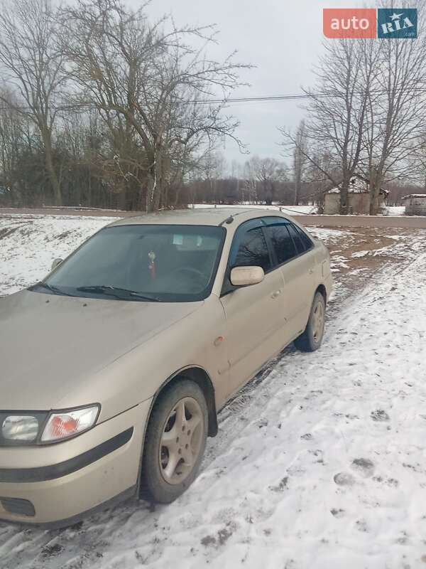 Хетчбек Mazda 626 1998 в Ємільчиному фото 2 Хетчбек Mazda 626 1998 в Ємільчиному