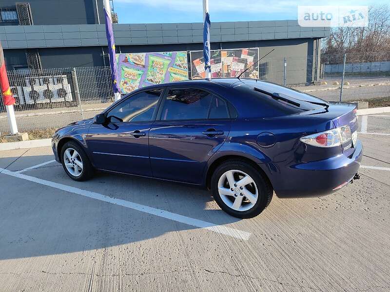 2005 Mazda 6, VIN JMZGG143661621531:plate — photo 1 (autoria)