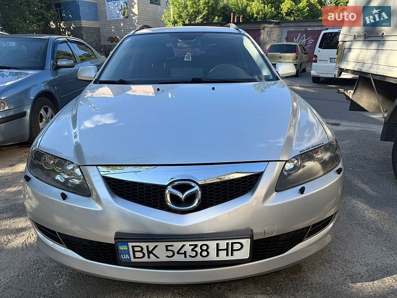 2007 Mazda 6, VIN JMZGY198271477269:plate — фото 1 (autoria)