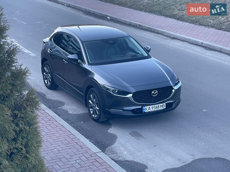 2024 Mazda CX-30, VIN JMZDMEW7X00423608:plate — photo 1 (autoria)