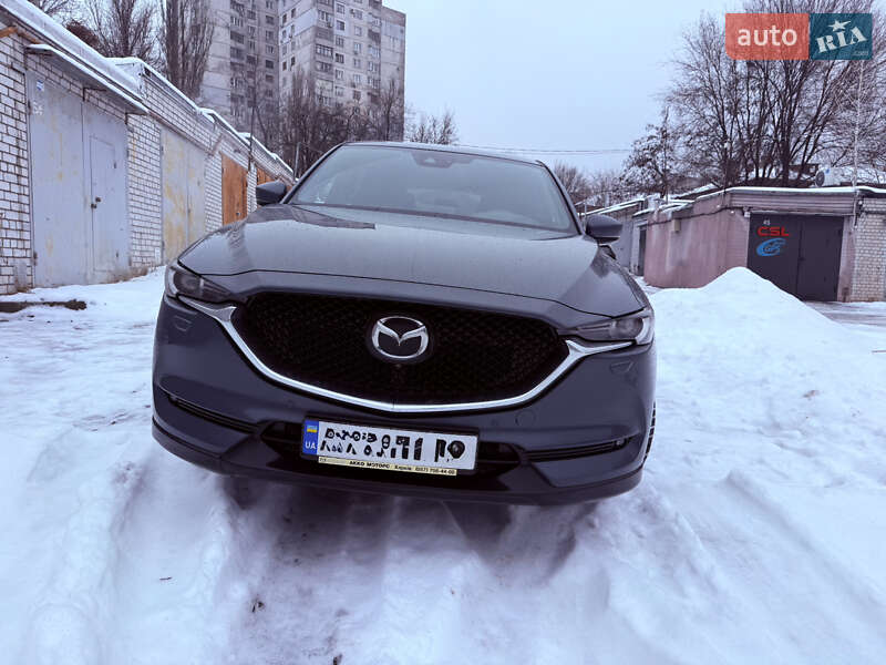2020 Mazda CX-5, VIN JMZKFGWMA90101337:plate — photo 1 (autoria)