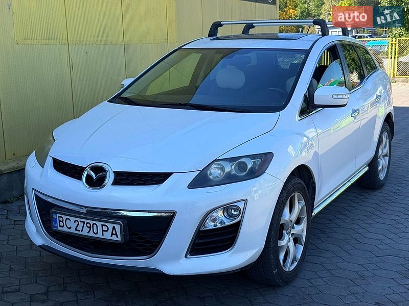 2011 Mazda CX-7, VIN JMZERH9A600237126:plate — photo 1 (autoria)