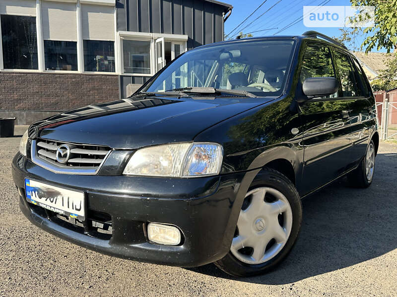 Хэтчбек Mazda Demio 2002 в 