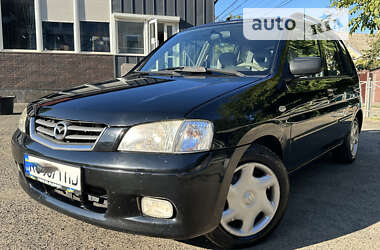 Хэтчбек Mazda Demio 2002 в 