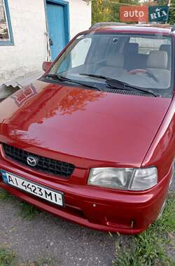 Хэтчбек Mazda Demio 1999 в 