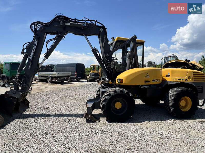 Колісний екскаватор Mecalac 12MXT 2010 в Недобоївцях