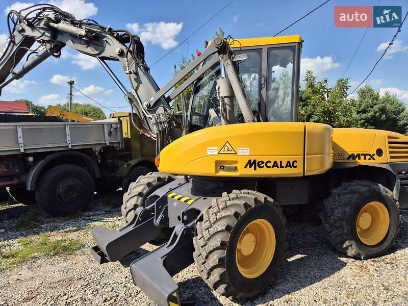 Колесный экскаватор Mecalac 12MXT 2011 в Бучаче фото 7 Колесный экскаватор Mecalac 12MXT 2011 в Бучаче