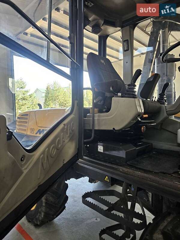 Колесный экскаватор Mecalac 12MXT 2011 в Бучаче фото 28 Колесный экскаватор Mecalac 12MXT 2011 в Бучаче