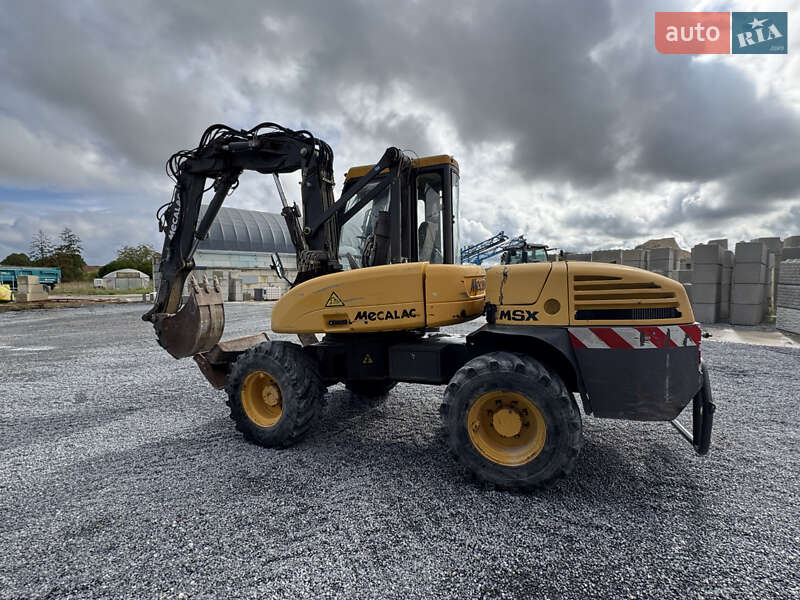 Колісний екскаватор Mecalac 12MXT 2006 в Чернівцях