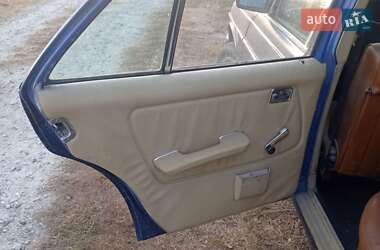 Седан Mercedes-Benz E-Class 1980 в 