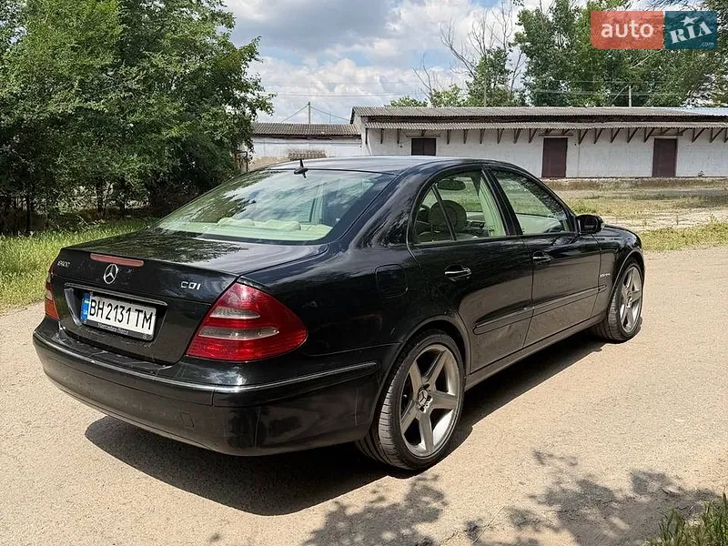 Mercedes-Benz E-Class 2003 VIN WDB2110281A340670 фото оголошення 12 з 66