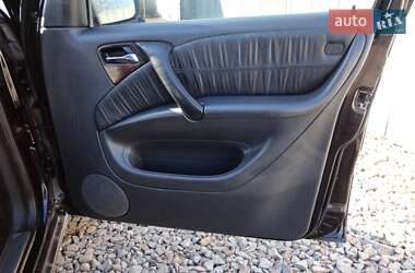 Внедорожник / Кроссовер Mercedes-Benz M-Class 2004 в 