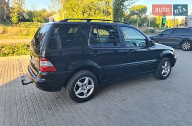 Позашляховик / Кросовер Mercedes-Benz M-Class 2004 в 