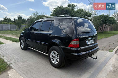 Внедорожник / Кроссовер Mercedes-Benz M-Class 2004 в 
