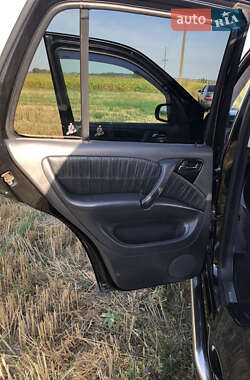 Внедорожник / Кроссовер Mercedes-Benz M-Class 2004 в 